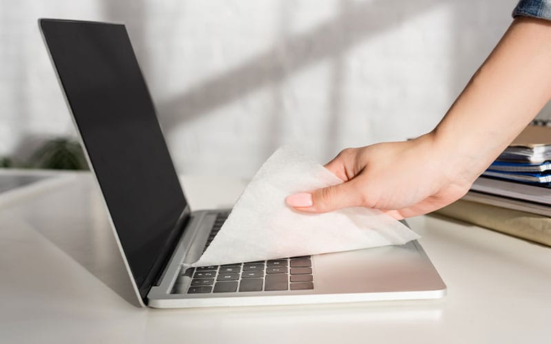 Cleaning Laptop With Wipe