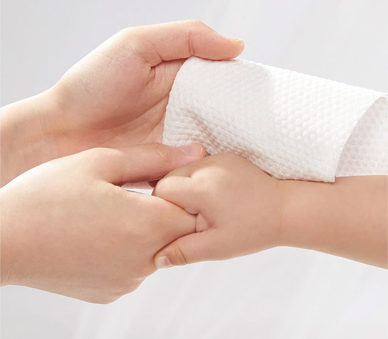 Folded Wet Wipe In Hands