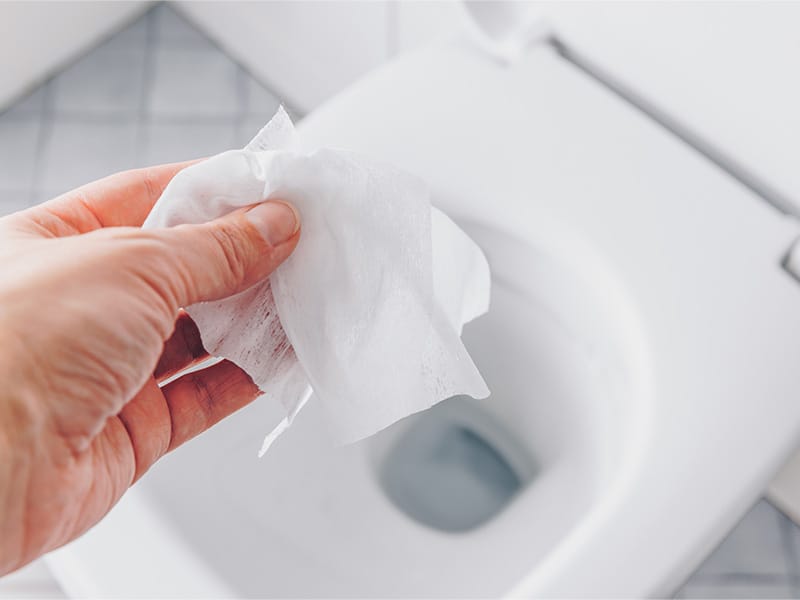 Pulling Wipe From Tissue Box