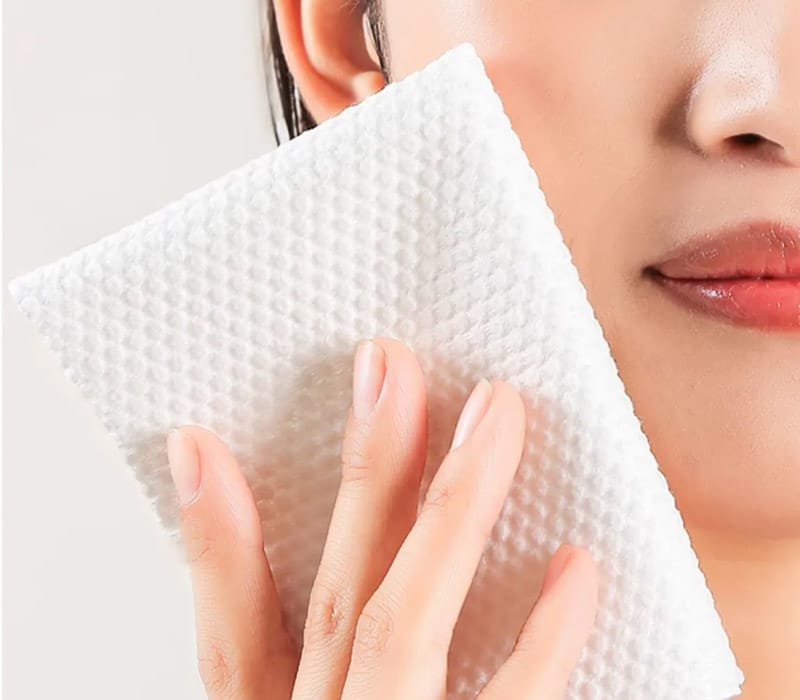 Woman Using Soft Facial Wipe